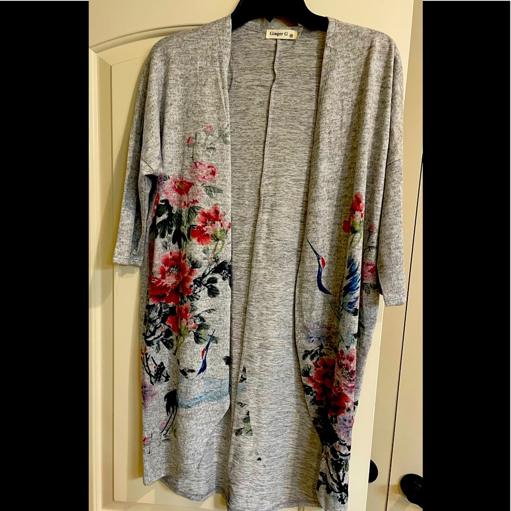 3/4 sleeve cardigan. Cute with a tee. New without tags. Size medium